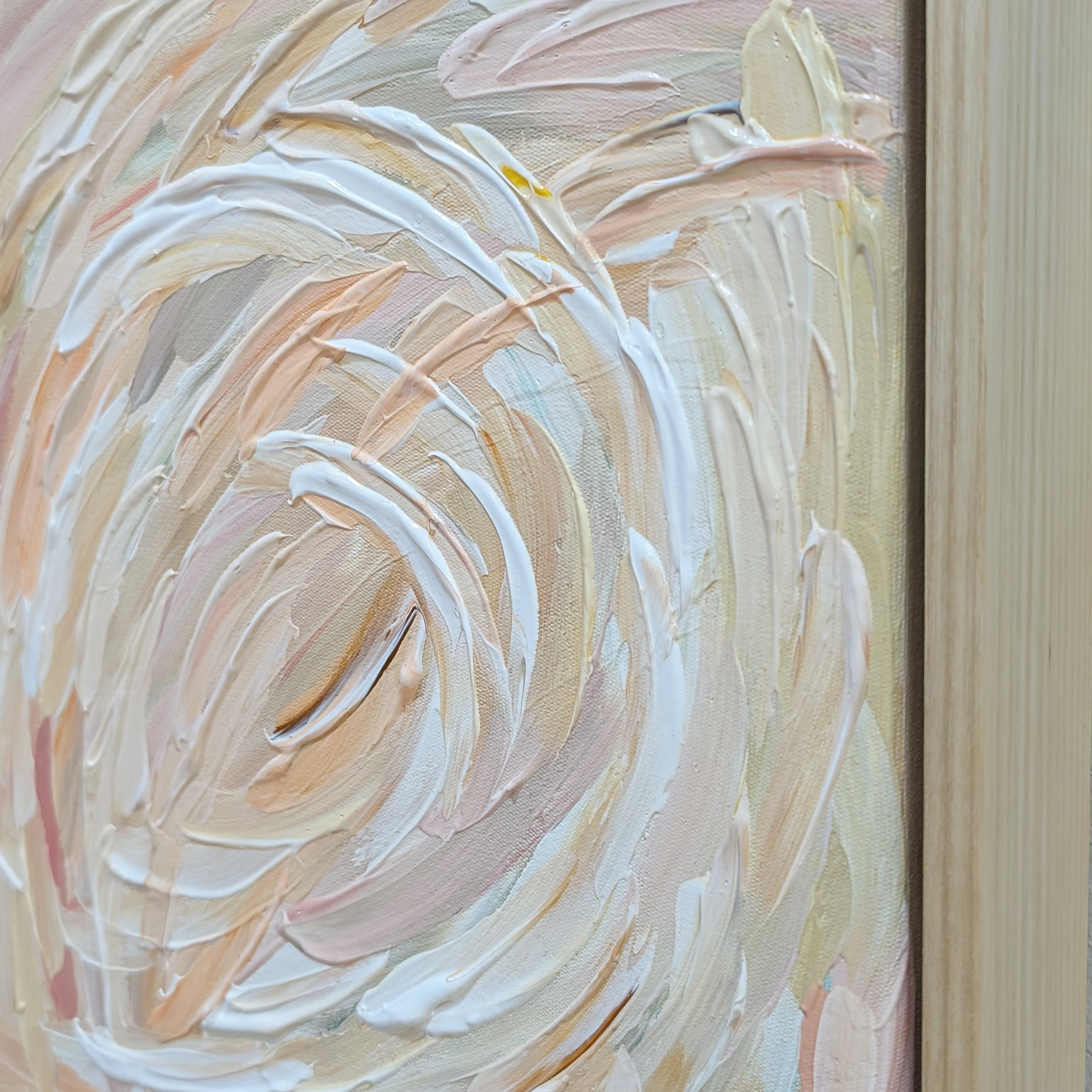 Textured abstract painting with swirling brushstrokes in beige, brown, and white on an oak wooden frame. Influenced my the Tasmanian landscape and the snowstorms on the overland track. 