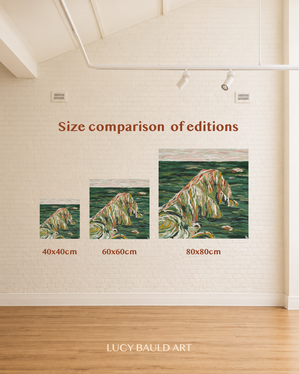 A size comparison display showing three versions of a zebra painting in different dimensions: 40x40cm, 60x60cm, and 80x80cm, mounted on a cream brick wall with 'Size comparison of editions' written above and 'LUCY BAULD ART' at the bottom. Art by Australian abstract artist Lucy Bauld. 